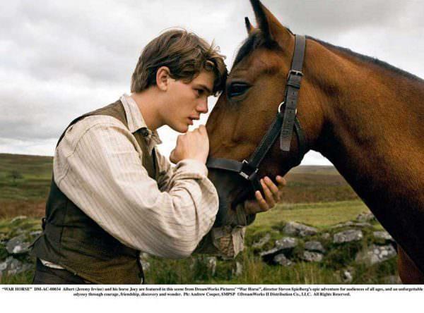 "WAR HORSE"DM-AC-00034Albert (Jeremy Irvine) and his horse Joey are featured in this scene from DreamWorks Pictures' "War Horse", director Steven Spielberg's epic adventure for audiences of all ages, and an unforgettable odyssey through courage, friendship, discovery and wonder.Ph: Andrew Cooper, SMPSPÂ©DreamWorks II Distribution Co., LLC. Â All Rights Reserved.