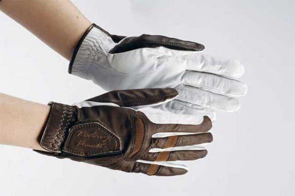 A pair of white and brown Rodney Powell Show Jumping gloves.