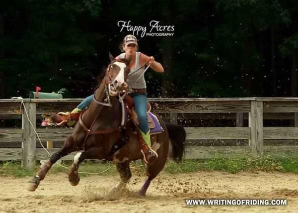 Yank, yank, yank is what this rider does to her barrel horse.