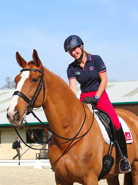 Horseback riding helmets are encouraged even at the highest levels of the sport.